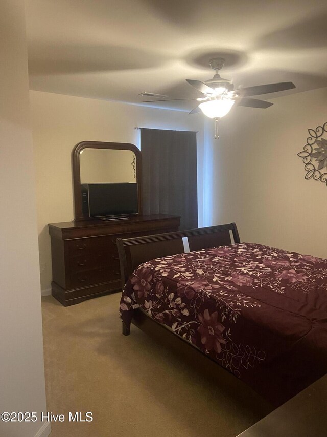 49 Patrick Henry Cir NW, Supply, NC 28462 - carpeted bedroom with ceiling fan