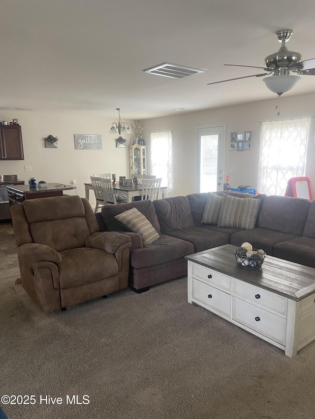 49 Patrick Henry Cir NW, Supply, NC 28462 - living room featuring carpet floors and a ceiling fan