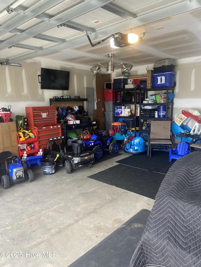 49 Patrick Henry Cir NW, Supply, NC 28462 - garage featuring a garage door opener