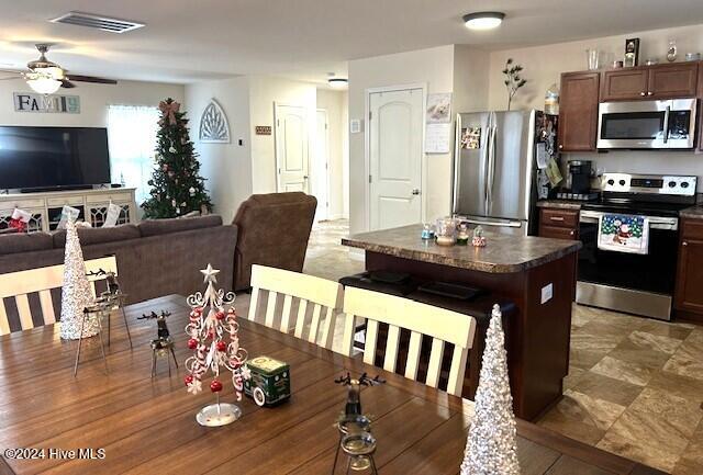 dining area featuring ceiling fan