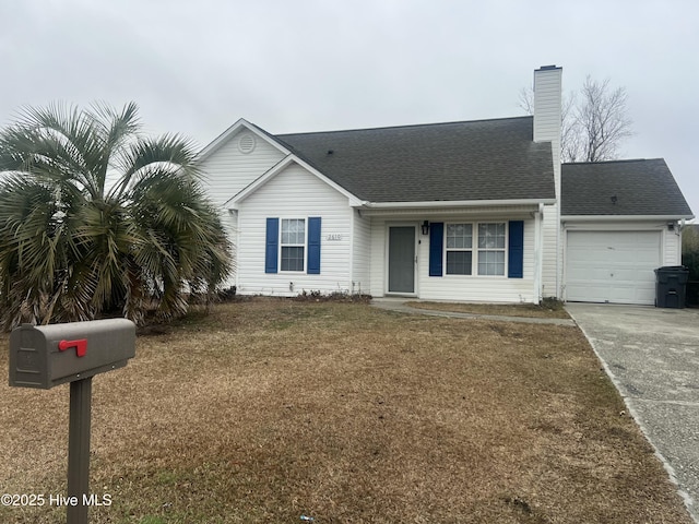 single story home with a garage and a front lawn