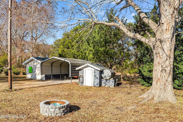 view of outbuilding featuring a carport