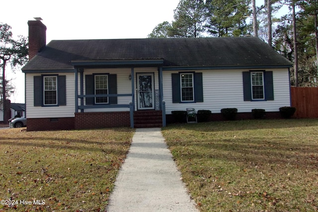 view of front of home featuring a porch and a front lawn