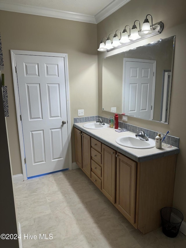 bathroom featuring vanity and crown molding