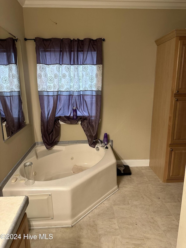 bathroom with a tub, crown molding, and vanity