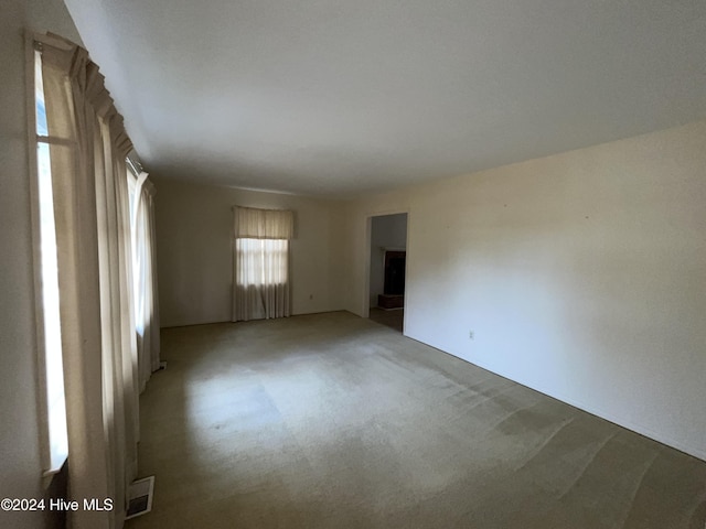 unfurnished room with carpet