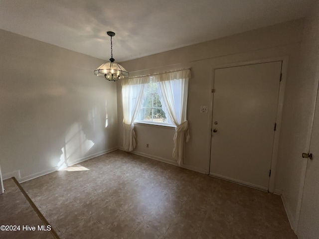 interior space with a chandelier