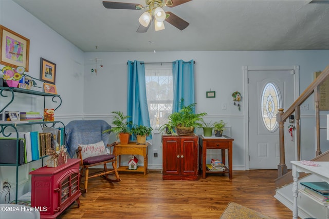 foyer with hardwood / wood-style flooring and ceiling fan