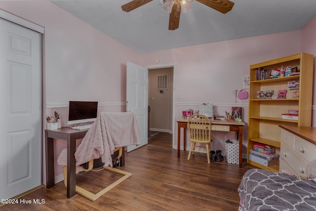 office area featuring ceiling fan and dark wood-type flooring