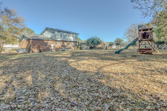 view of yard featuring a playground