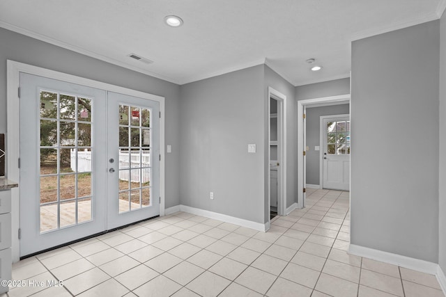 doorway to outside featuring french doors, light tile patterned flooring, plenty of natural light, and ornamental molding