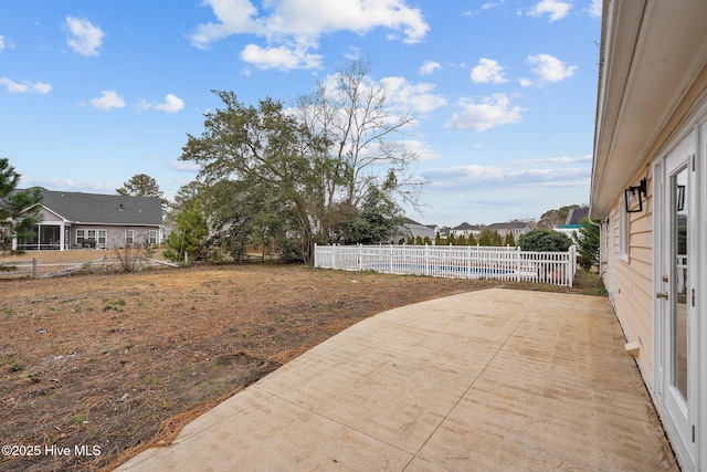 view of yard with a swimming pool and a patio