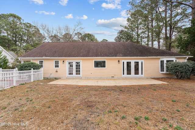 back of property with french doors and a patio