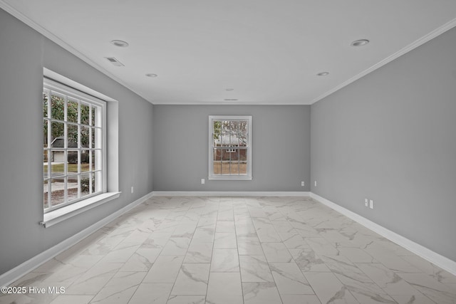 unfurnished room featuring crown molding