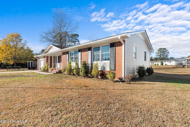 ranch-style house with a front yard