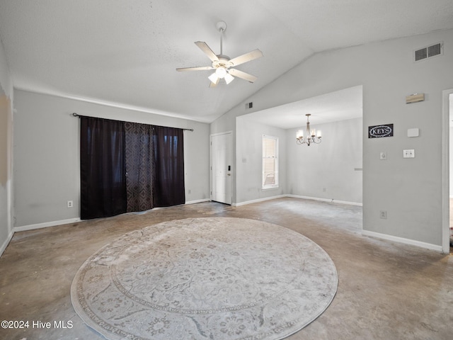 foyer entrance featuring a textured ceiling, ceiling fan with notable chandelier, and lofted ceiling