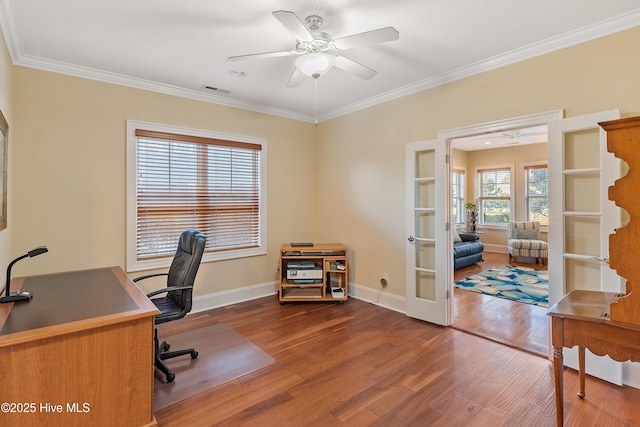 home office with hardwood / wood-style floors, ceiling fan, ornamental molding, and french doors