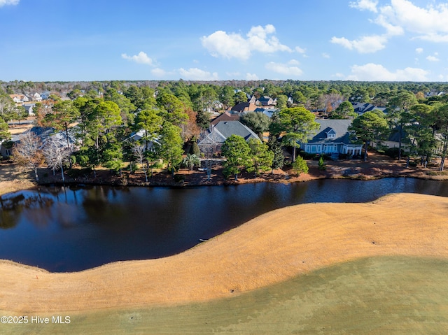 drone / aerial view with a water view