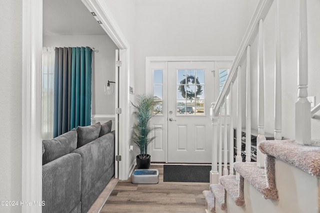 foyer entrance with light hardwood / wood-style flooring