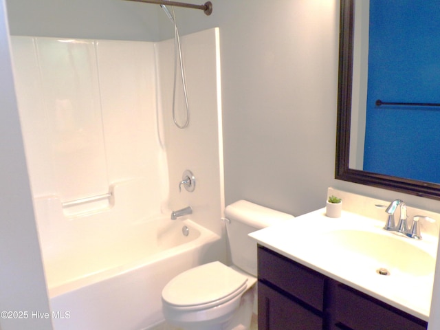 full bathroom featuring vanity, shower / bath combination, and toilet