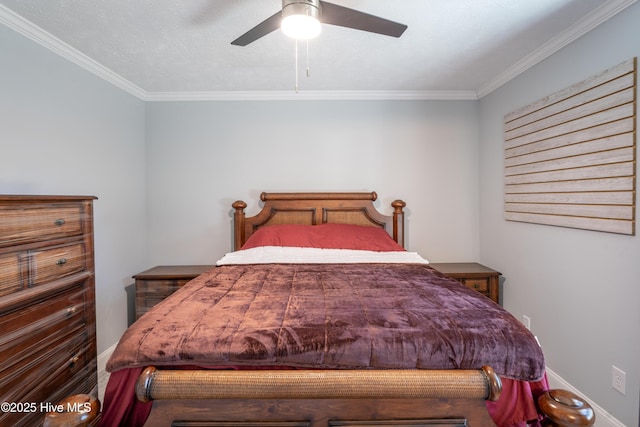 bedroom with ceiling fan and ornamental molding