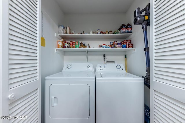 laundry room with washer and dryer