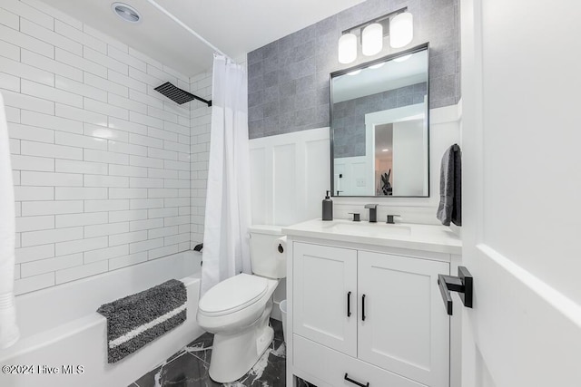 full bathroom with vanity, toilet, and shower / tub combo