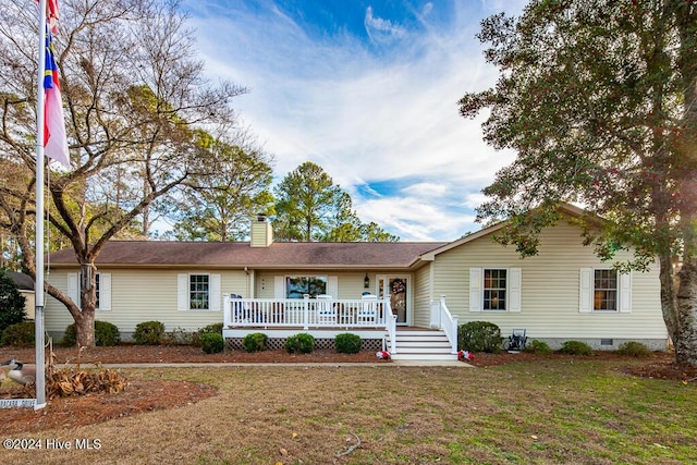 ranch-style house with a front yard