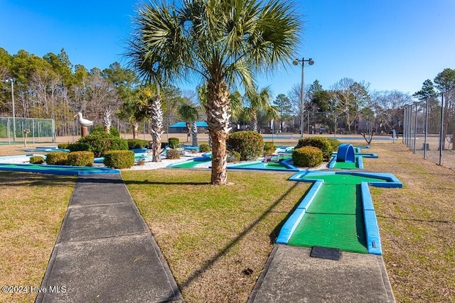 view of home's community featuring a yard