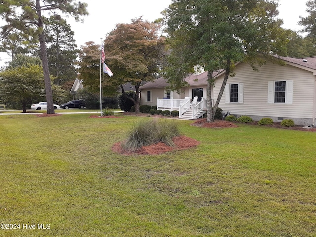 view of front of house featuring a porch and a front yard