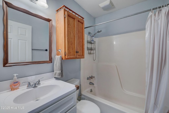 full bathroom featuring vanity, toilet, and shower / bath combo with shower curtain