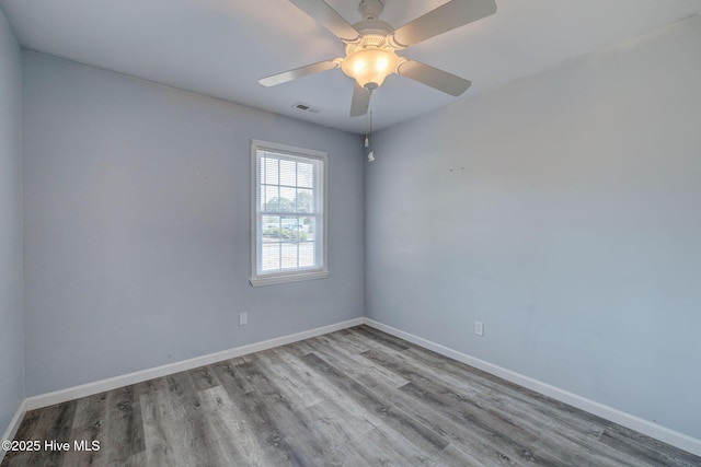 unfurnished room featuring ceiling fan and light hardwood / wood-style flooring