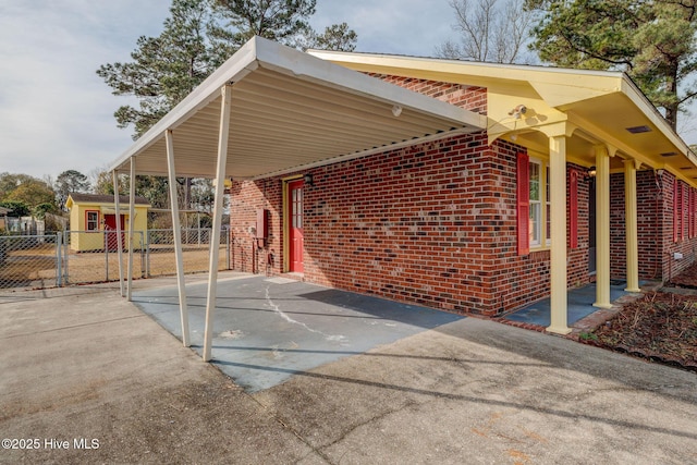 view of property exterior featuring a carport