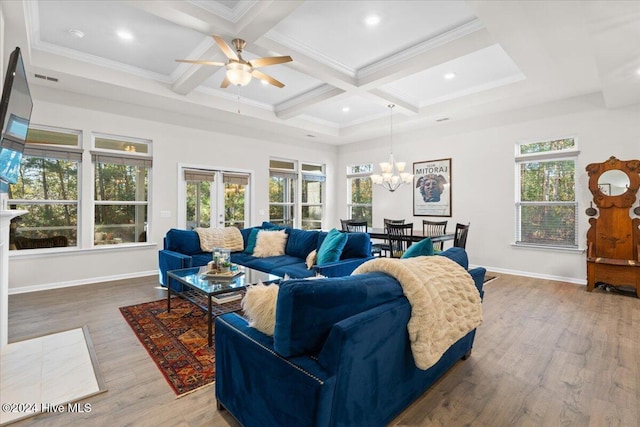 living room featuring crown molding, hardwood / wood-style floors, beam ceiling, coffered ceiling, and french doors