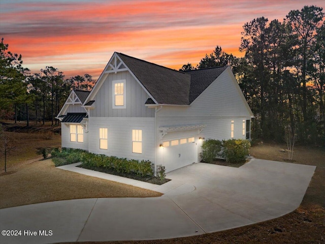 view of front of property with a garage