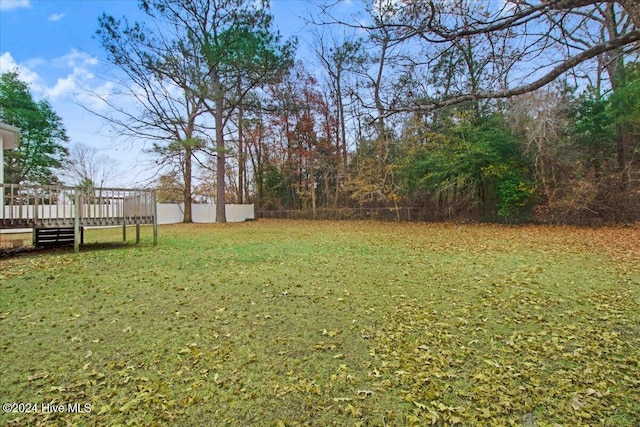 view of yard featuring a deck