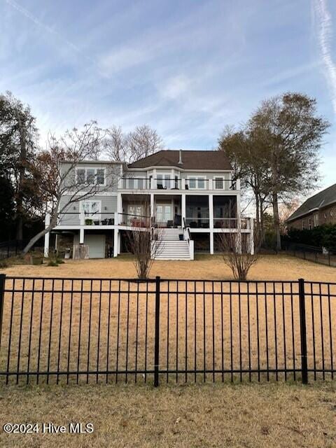 view of front of house with a balcony