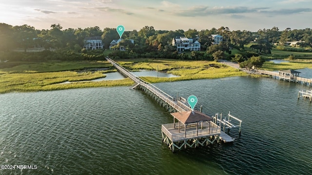 dock area featuring a water view