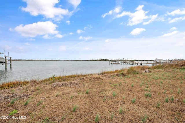 property view of water featuring a dock