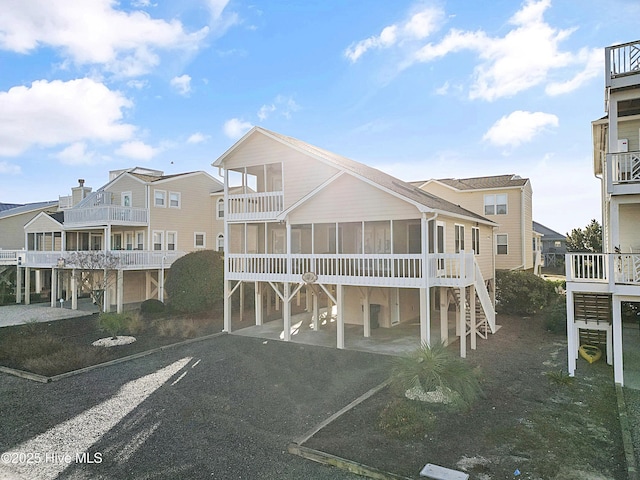 view of front of house with a carport