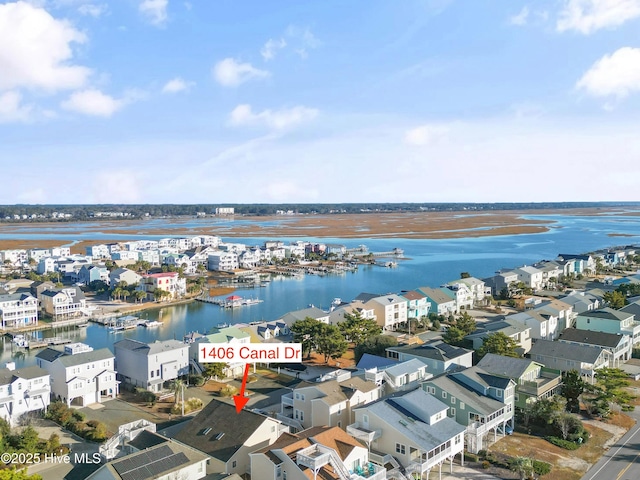 drone / aerial view with a water view