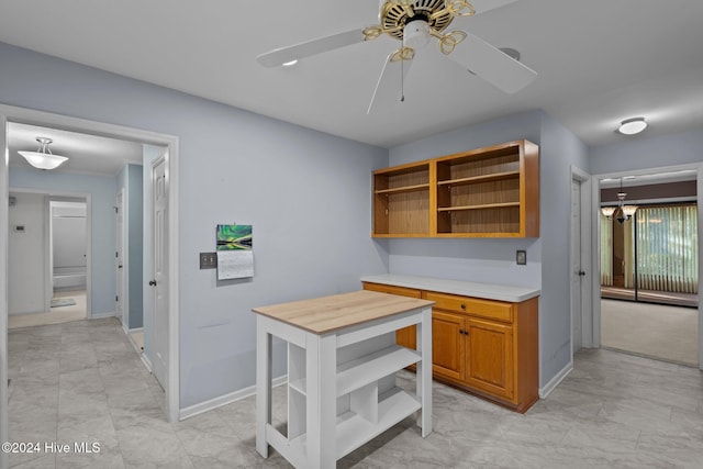 kitchen featuring ceiling fan