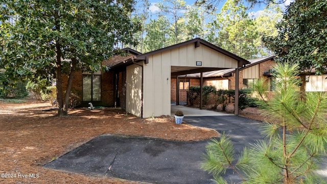 view of front of house with a carport