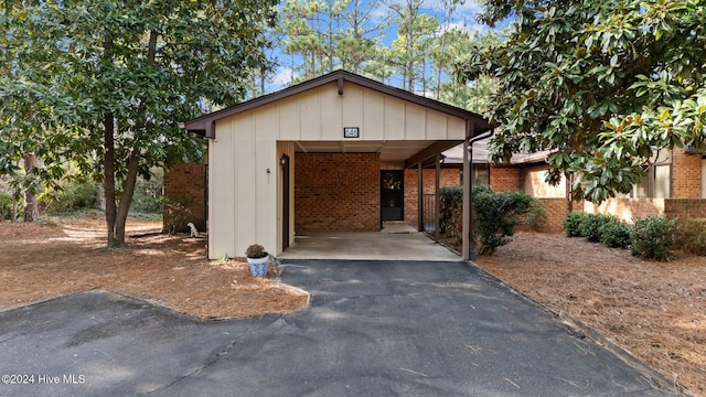 view of front of house with a carport