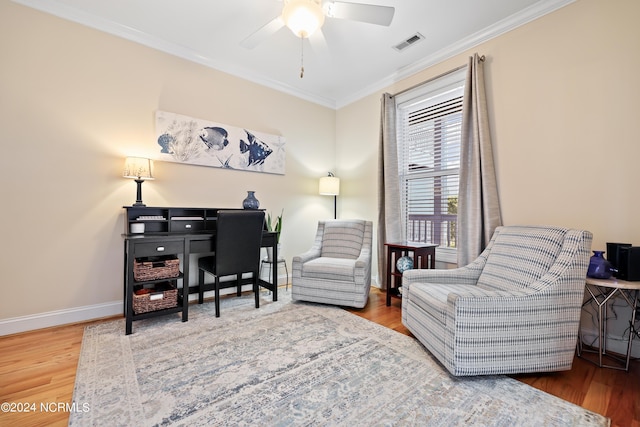 office area with ornamental molding, hardwood / wood-style floors, and ceiling fan