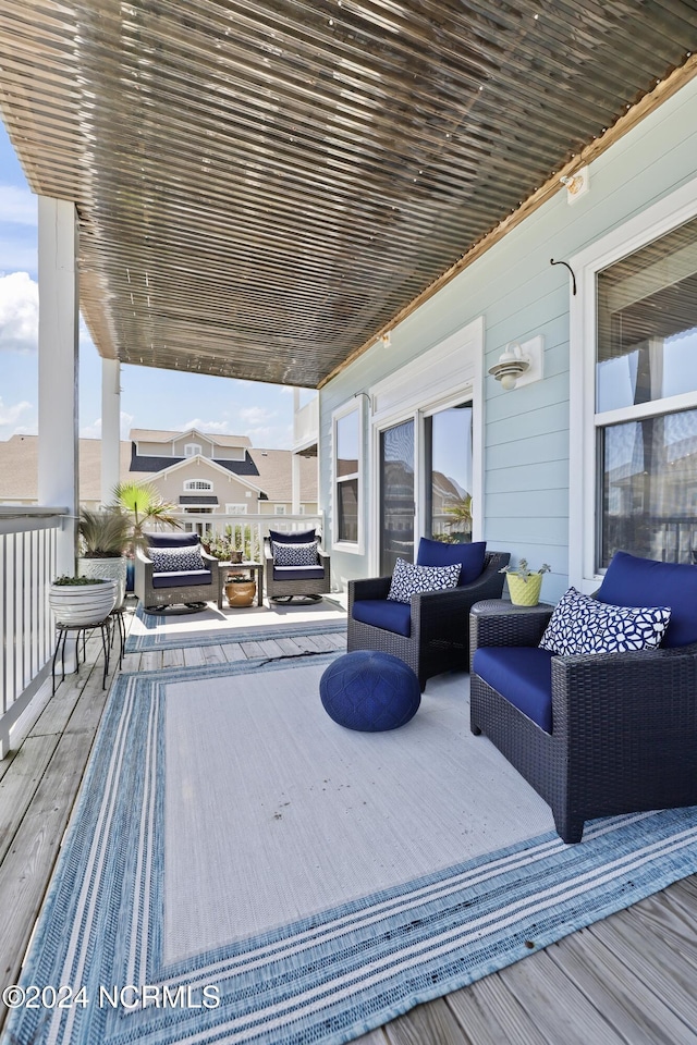 deck featuring outdoor lounge area