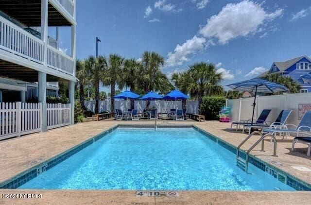 view of pool with a patio