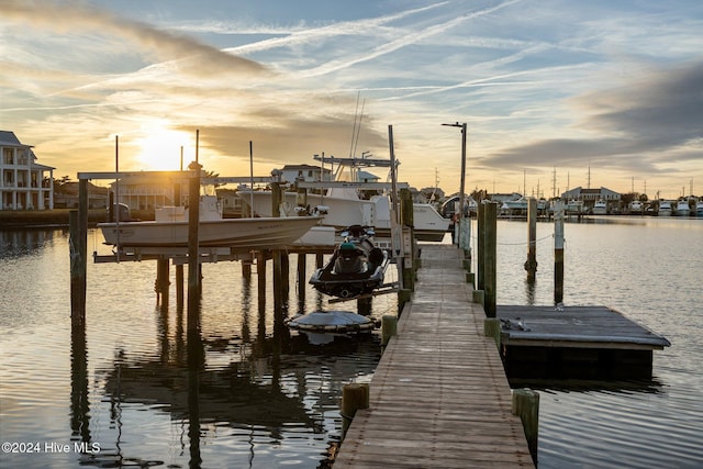 dock area featuring a water view