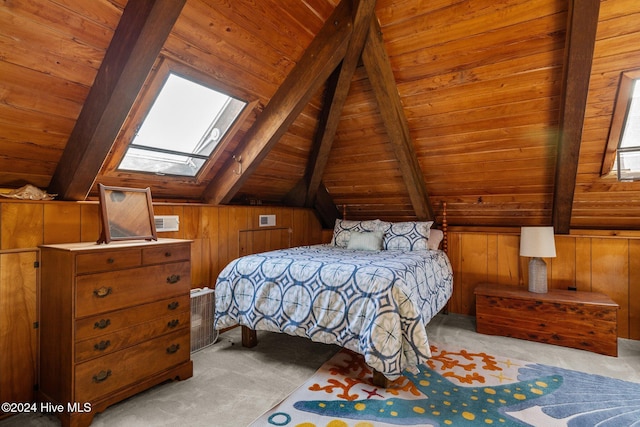 bedroom with vaulted ceiling with skylight, wooden ceiling, and wooden walls