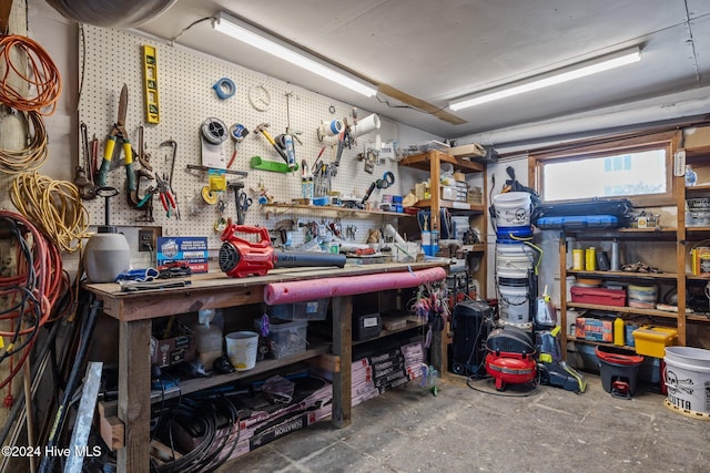 garage with a workshop area